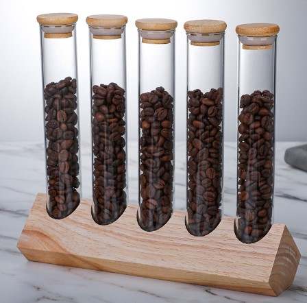Glasstuber til kaffeoppbevaing
